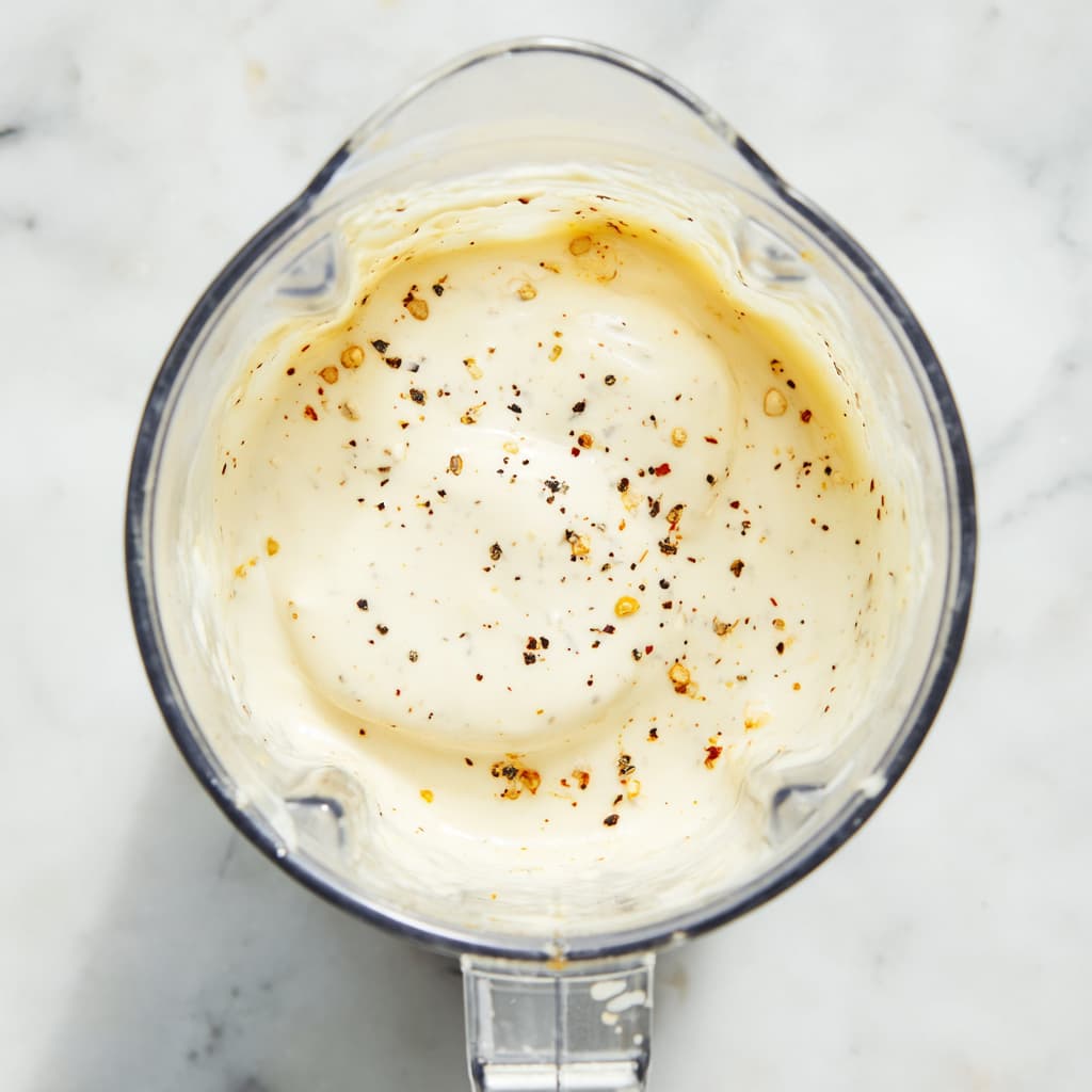 Blended cottage cheese and Greek yogurt cheese sauce for high protein cauliflower bake.